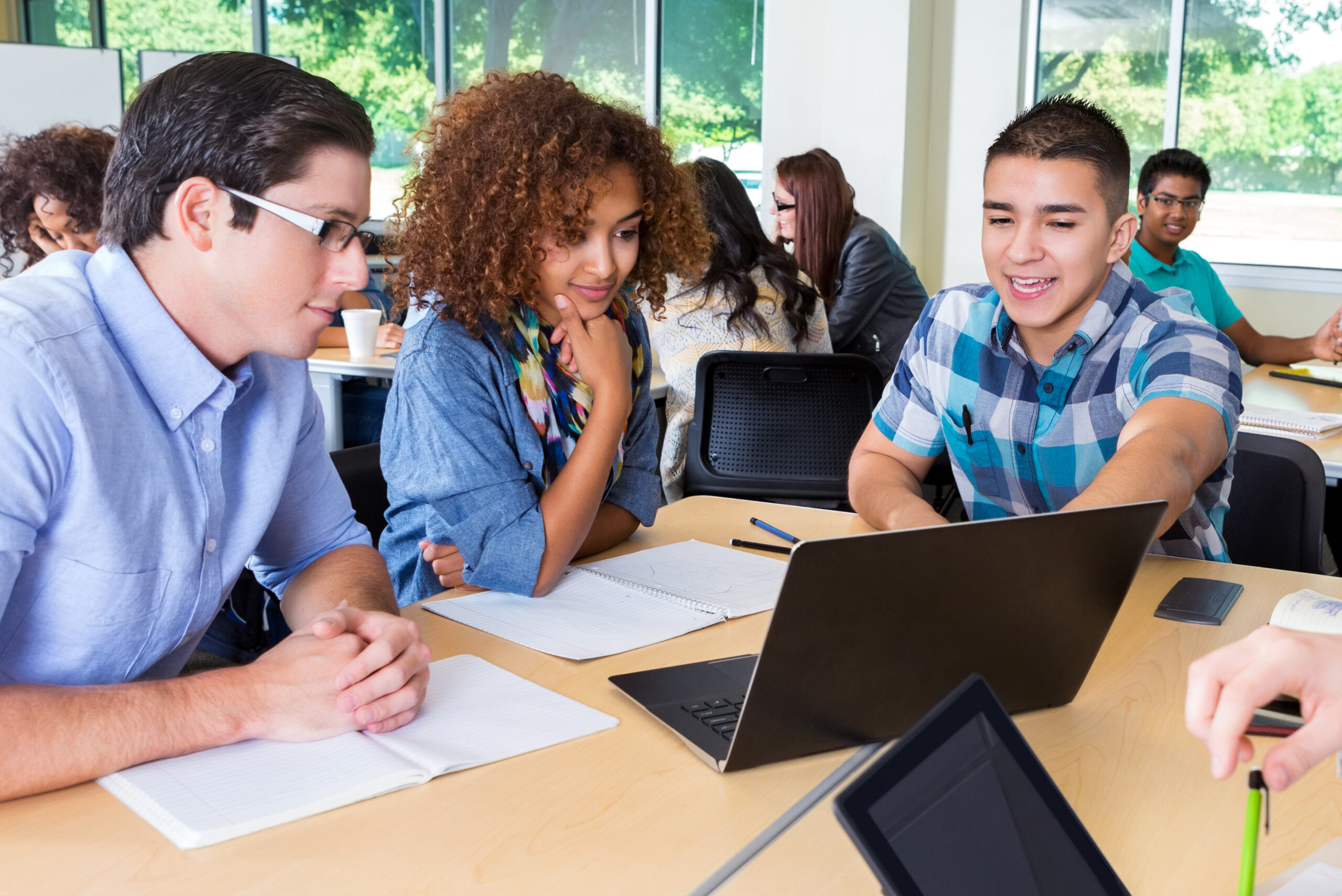 College study group brainstorming together in classroom or library students studying